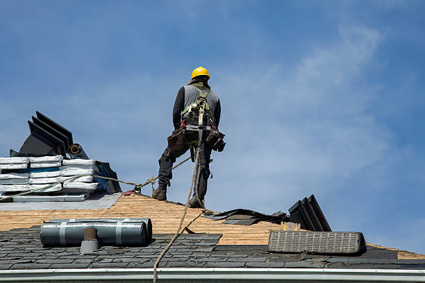 Professional Roofing technician working in Tomkins Cove, NY